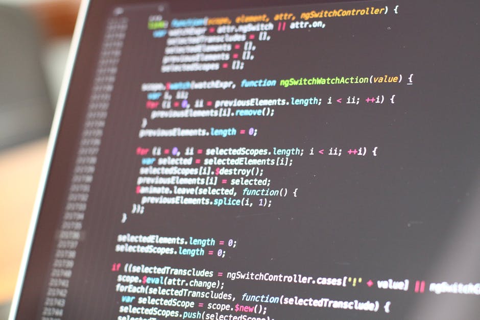 A computer screen displaying a dark-themed code editor with HTML code visible. The code includes tags such as <html>, <head>, <title>, and <body>, with some CSS references. The text is in various colo